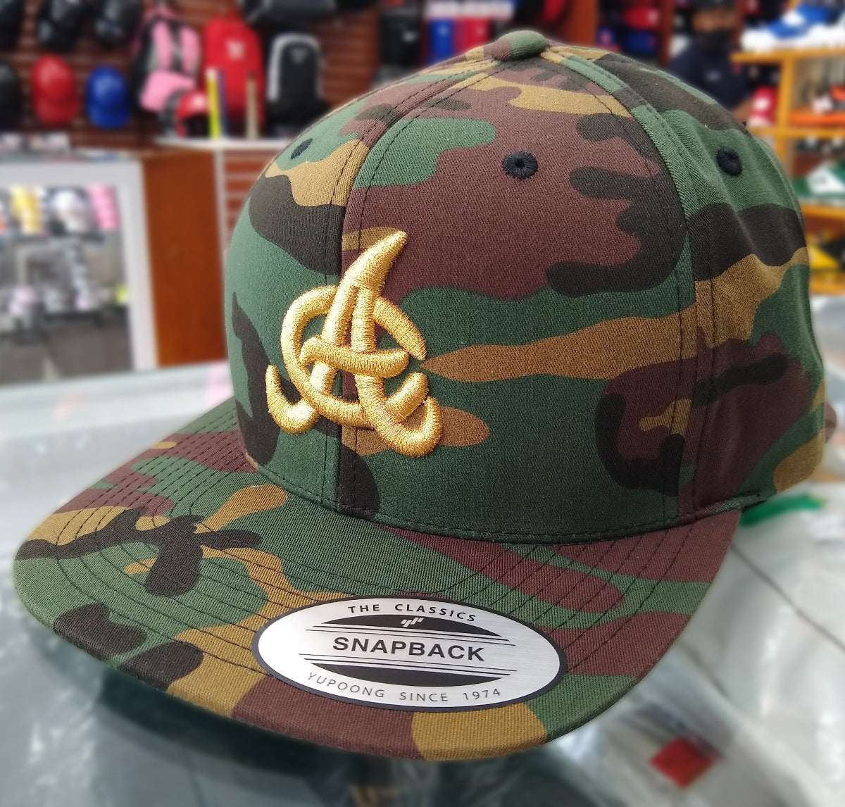 Aguilas Cibaeñas Embroidered Snapback Camouflage Hat product image 3, provided for visual reference and product detail review