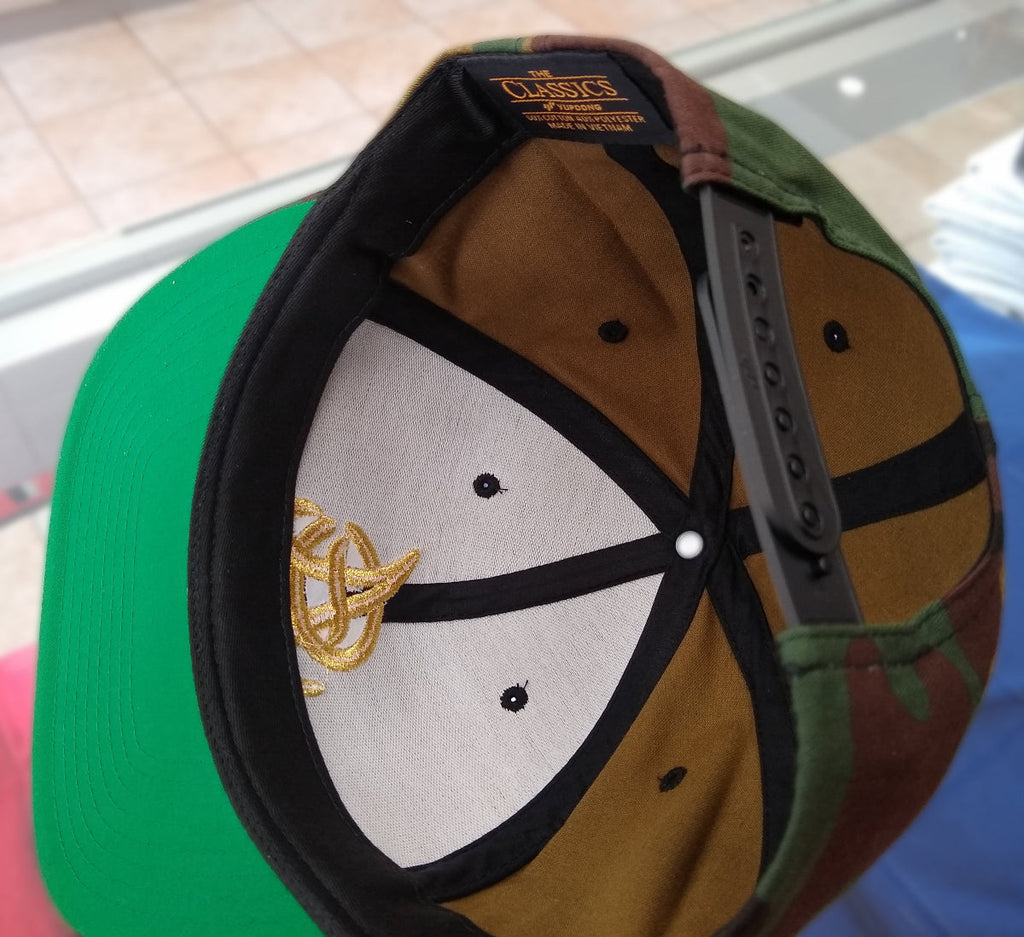 Aguilas Cibaeñas Embroidered Snapback Camouflage Hat product image 5, provided for visual reference and product detail review