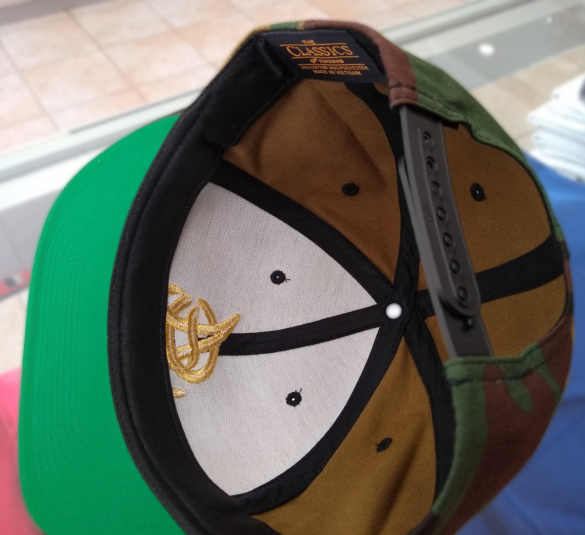 Aguilas Cibaeñas Embroidered Snapback Camouflage Hat product image 5, provided for visual reference and product detail review