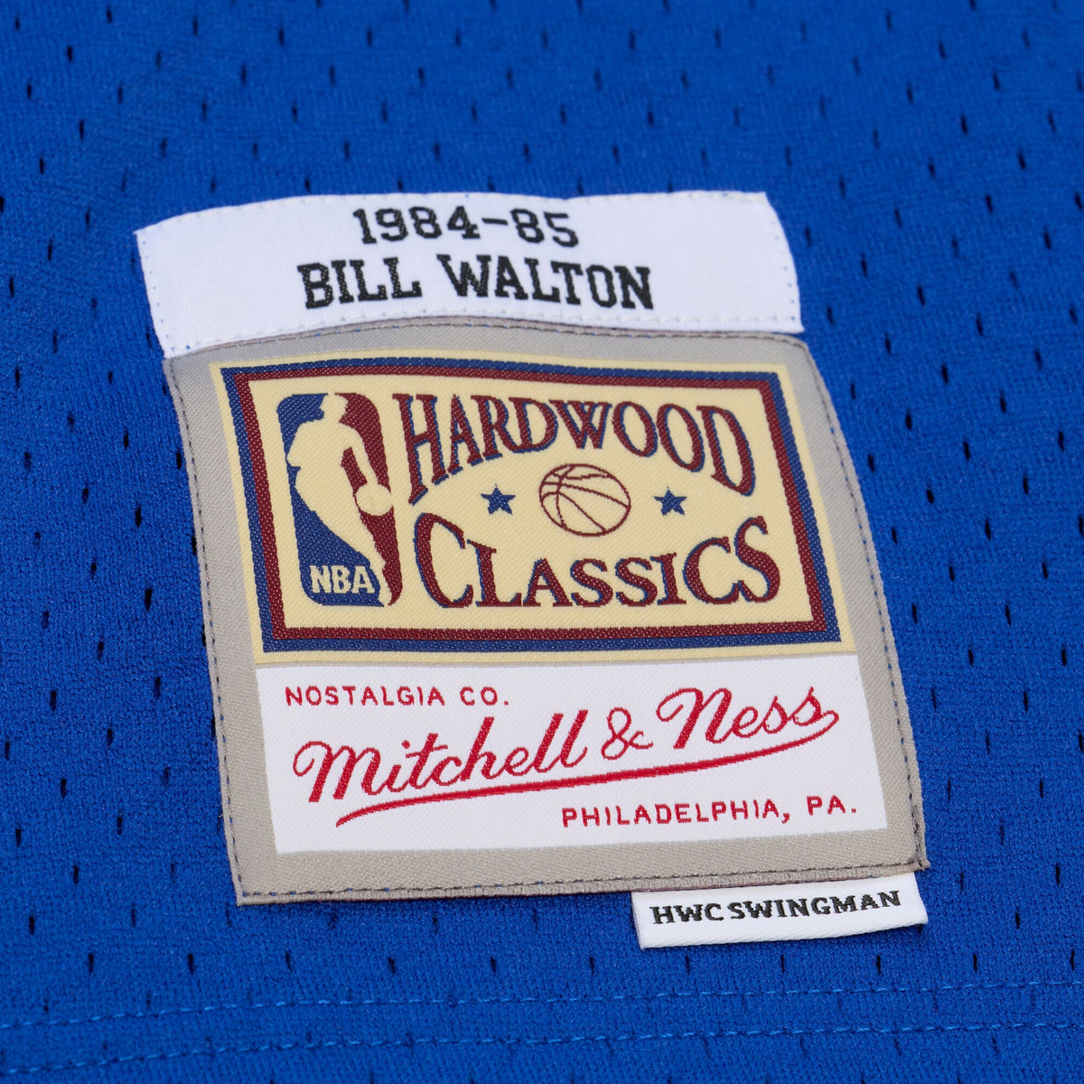 LA Clippers Bill Walton Mitchell & Ness Royal 1984-85 Swingman Jersey for Men product image 6, provided for visual reference